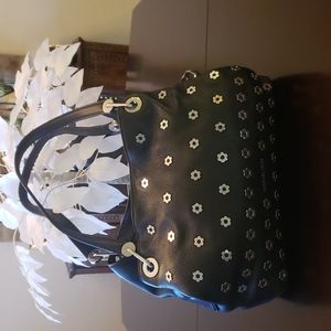 Michael Kors Selma Rivet satchel with decorative rivets.